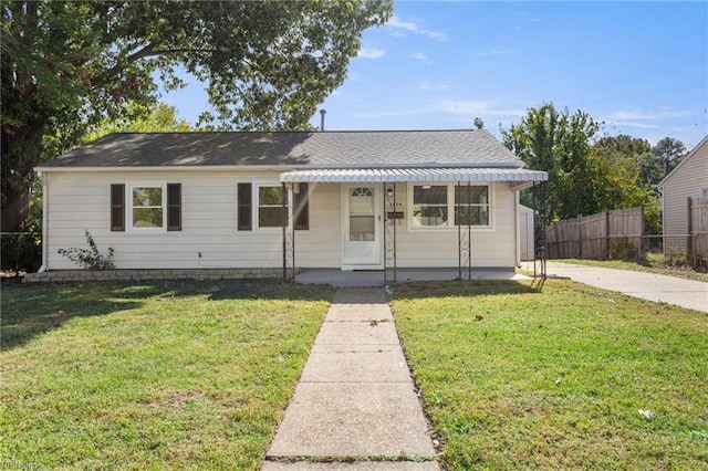 view of front facade with covered porch and a front lawn