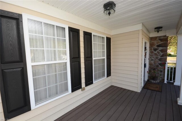 wooden terrace with covered porch