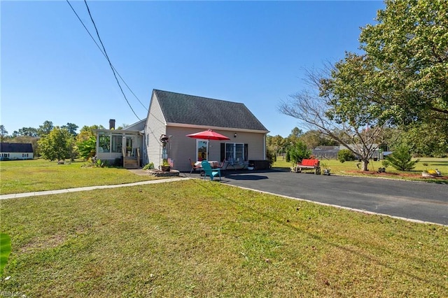 exterior space featuring a yard