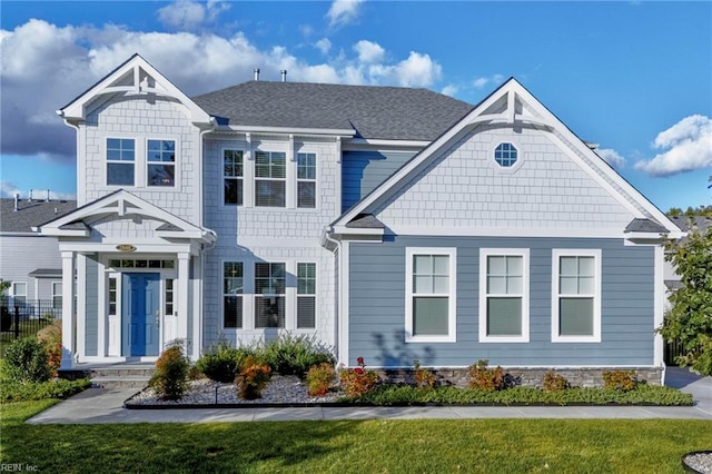 view of front facade with a front lawn