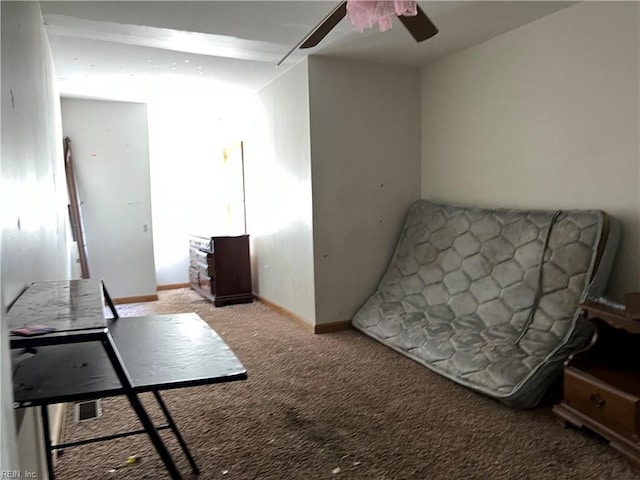 interior space featuring ceiling fan and light colored carpet