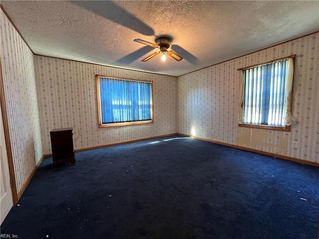 5225 Crumpler Rd, Ivor, VA 23866 - spare room featuring ceiling fan, a textured ceiling, and carpet floors