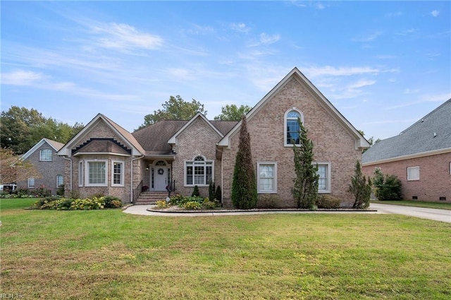 view of front of home featuring a front yard