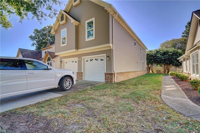 view of side of home with a garage