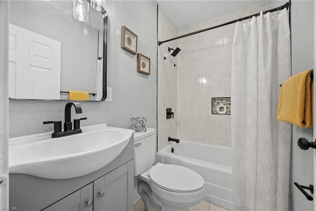 full bathroom with vanity, toilet, tile patterned floors, and shower / bath combo