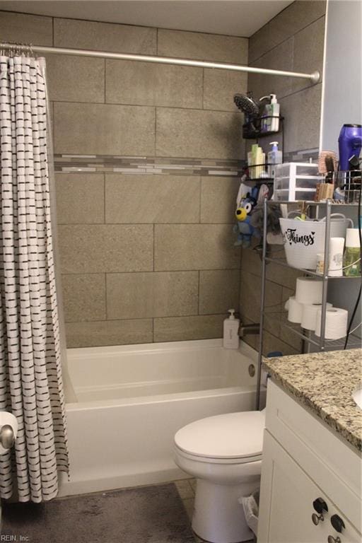 full bathroom with shower / tub combo, vanity, and toilet