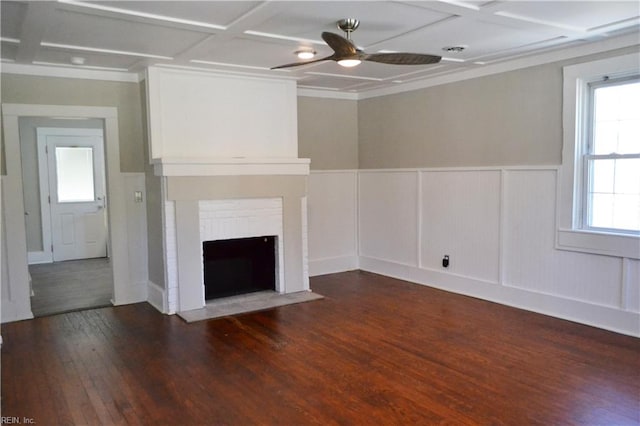 unfurnished living room featuring dark hardwood / wood-style floors, ceiling fan, and coffered ceiling