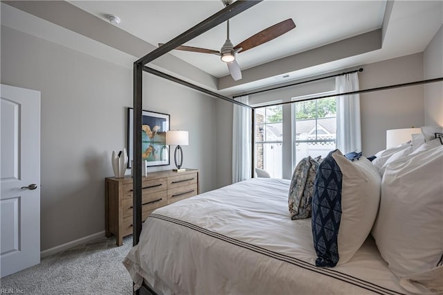 bedroom with light colored carpet and ceiling fan