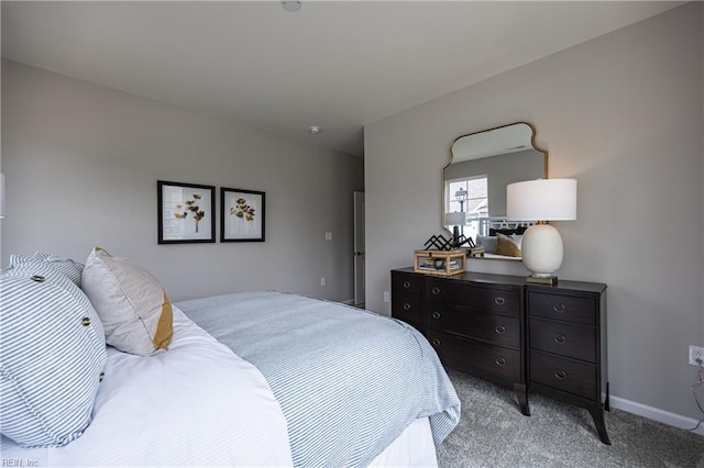 bedroom featuring light carpet