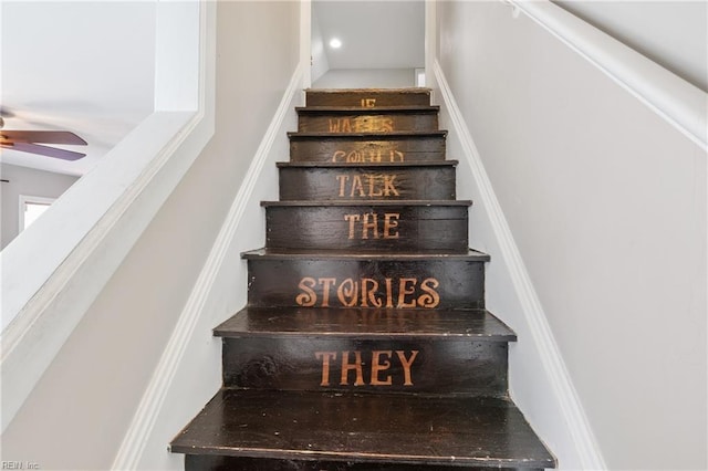 stairs with ceiling fan