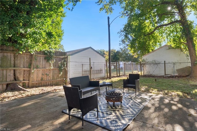 view of patio / terrace with a fire pit