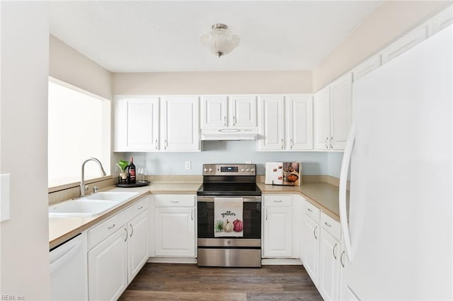 kitchen featuring white appliances, dark hardwood / wood-style flooring, sink, and white cabinets