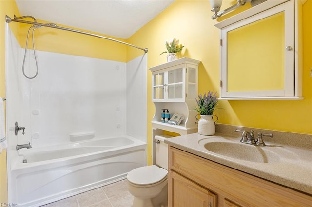 full bathroom with vanity, toilet, tile patterned floors, and shower / tub combination