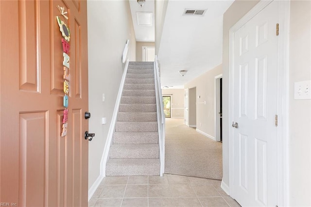 view of tiled foyer entrance