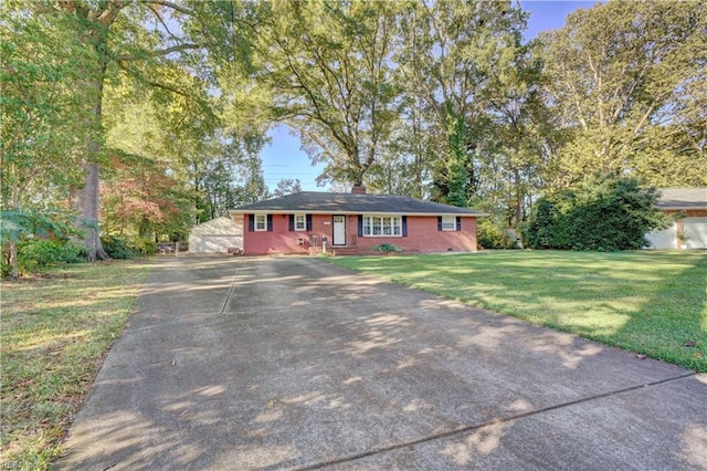 ranch-style home with a front yard