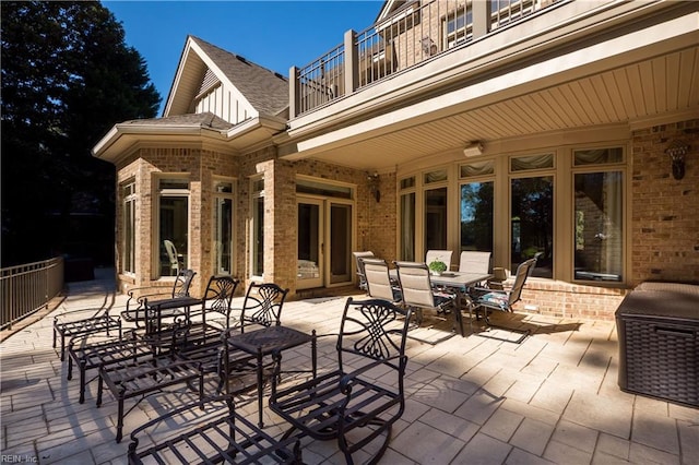 view of patio with a balcony