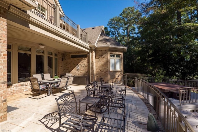 view of patio / terrace with a balcony