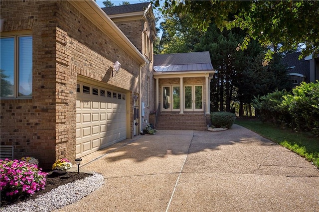 view of side of home with a garage