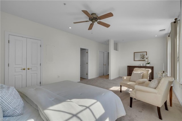 carpeted bedroom featuring ceiling fan