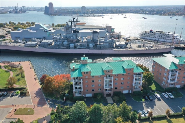 birds eye view of property featuring a water view