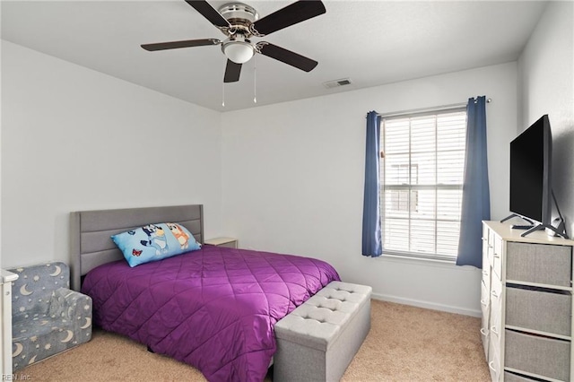 carpeted bedroom with ceiling fan