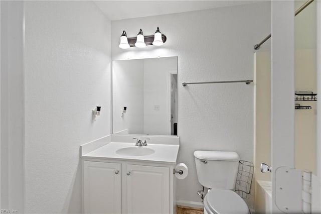 full bathroom with toilet, bathtub / shower combination, and vanity