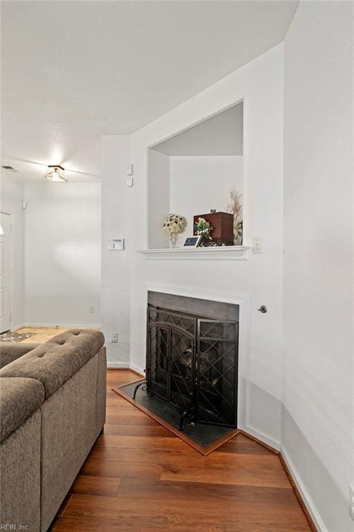 living room with wood-type flooring