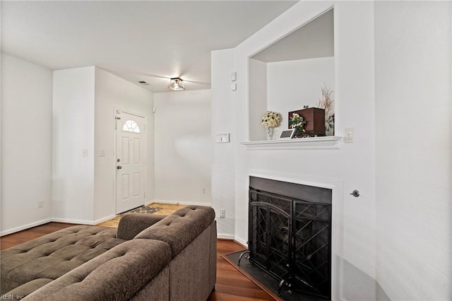 living room with dark wood-type flooring