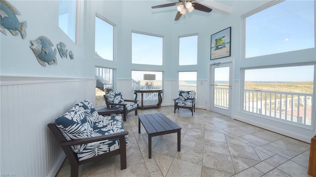 sunroom / solarium with ceiling fan