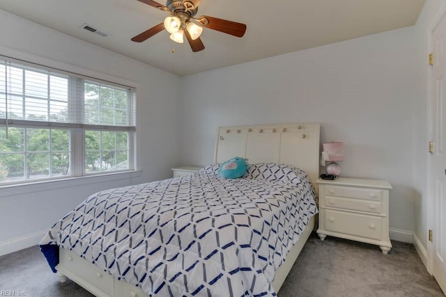 carpeted bedroom featuring ceiling fan