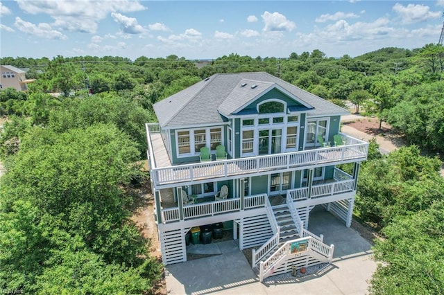 view of front of house with a balcony