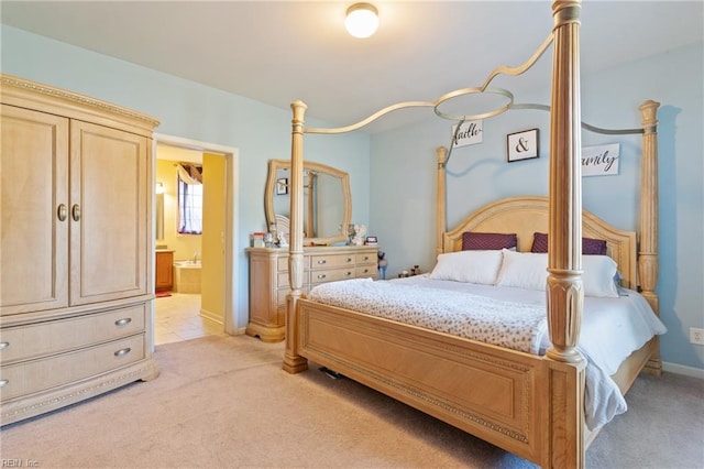 bedroom with light colored carpet