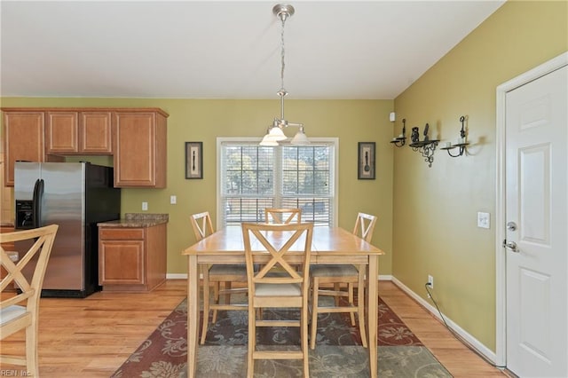 dining room featuring light hardwood / wood-style flooring