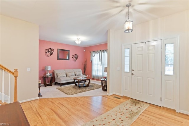 entrance foyer featuring light wood-type flooring