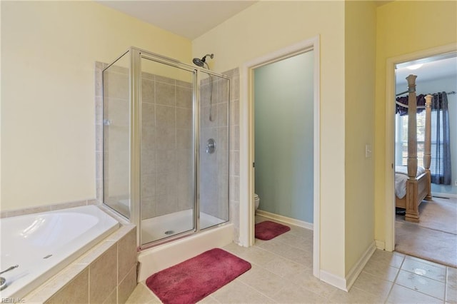 bathroom with toilet, independent shower and bath, and tile patterned floors