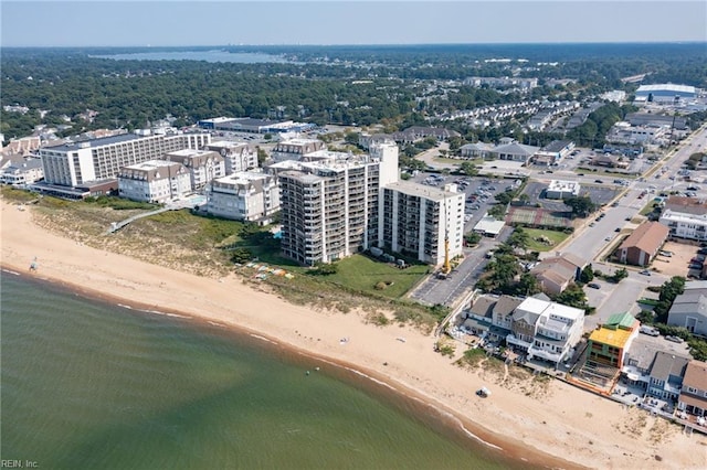 bird's eye view featuring a water view and a view of the beach