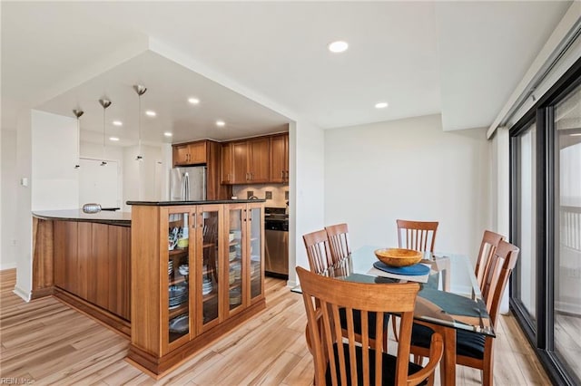 dining room featuring light hardwood / wood-style flooring