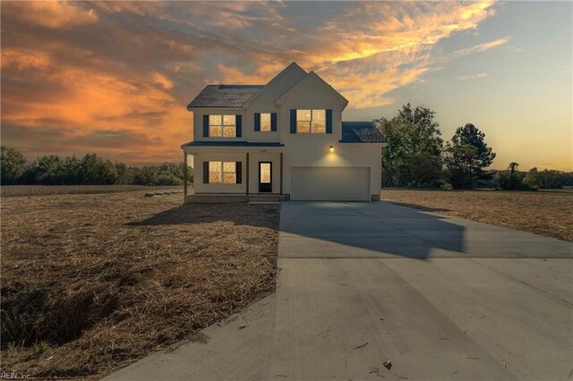 view of front of house with a garage