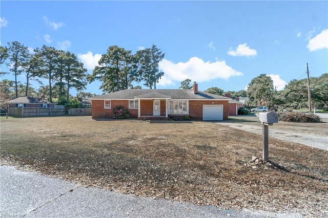 ranch-style home with a garage