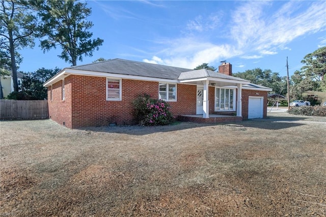 ranch-style home with a garage