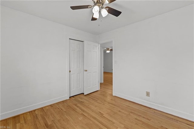 unfurnished bedroom with light hardwood / wood-style floors and ceiling fan