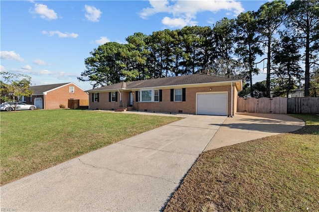 ranch-style house featuring a front lawn and a garage