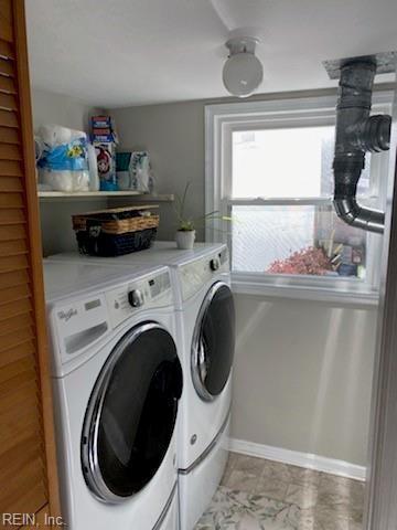 laundry area featuring washing machine and dryer