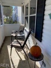 balcony featuring a porch