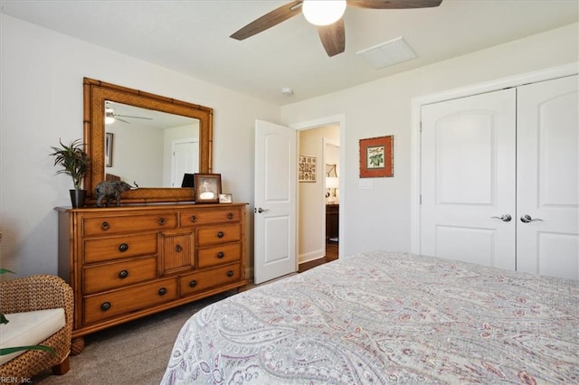 bedroom featuring a closet, ceiling fan, and dark carpet