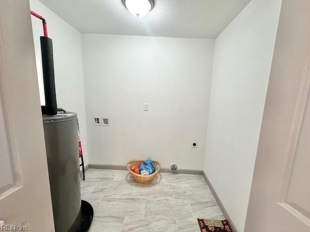 clothes washing area with hookup for an electric dryer and water heater