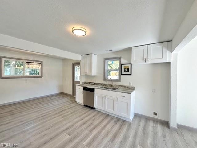 kitchen with sink, dishwasher, light wood-type flooring, and white cabinets