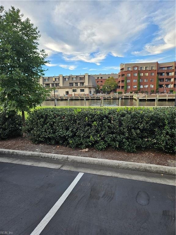 view of building exterior with a water view