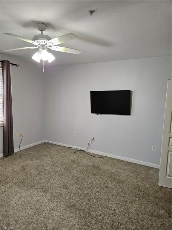 unfurnished room featuring carpet flooring and ceiling fan