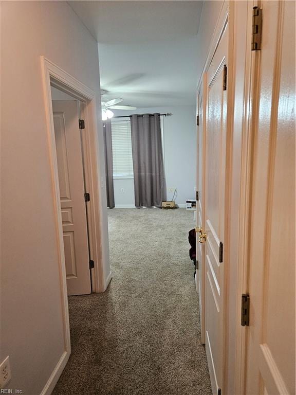 corridor with carpet floors